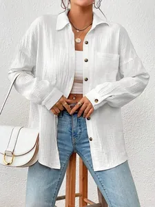 Elegant white long sleeve textured button-down blouse with dropped shoulders for women