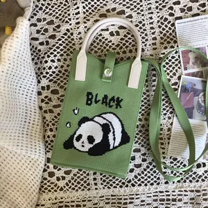 Casual green knitted mobile phone bag with cute panda design and white top handle