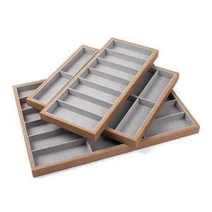 Plateaux de présentation de lunettes en bois avec doublure en velours gris pour comptoirs