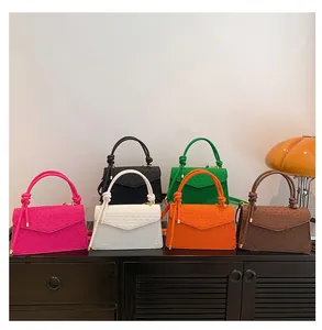 Group of minimalist retro small square crossbody bags in vibrant colors
