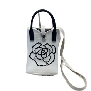 Stylish white knitted phone bag with black camellia floral embroidery pattern design