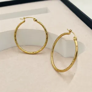 Elegant 24K gold plated large striped hoop earrings for women, stylish western style