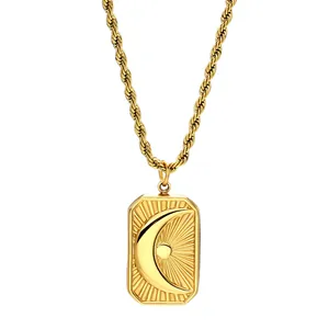 Vintage sun and moon embossed rectangular pendant necklace in gold-plated titanium steel.