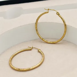 Romantic 24K gold plated striped hoop earrings for women with elegant texture