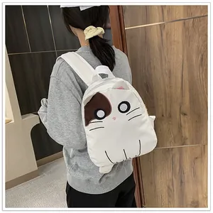 Adorable white canvas backpack with cute cat face design for girls' daily school life