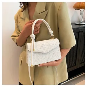 Elegant white retro square handbag for women with textured pattern and knot top handle