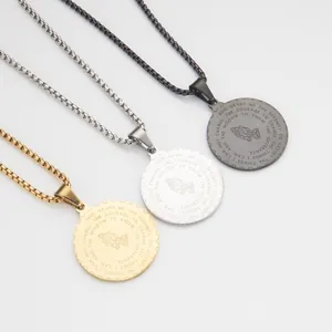 Detailed view of stainless steel praying hands round pendant necklaces in gold, silver, and black.