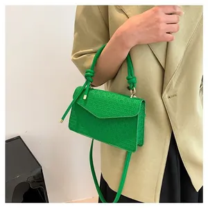 Retro green square crossbody handbag for women featuring a woven texture and knot handle