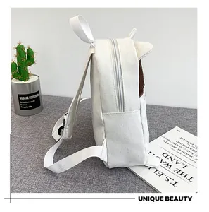 Detailed side view of a kawaii white canvas cat ear backpack for girls in Japanese style