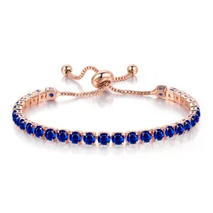 Elegant rose gold adjustable slider bracelet with round 4mm blue zircon stones.