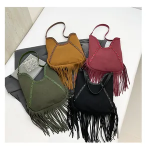 Collection of bohemian retro fringe shoulder tote bags in four vintage colors.