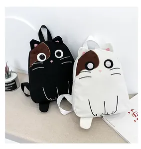 Cute Japanese style cat-shaped canvas backpacks for students in black and white colors