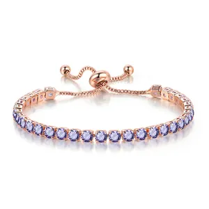 Close-up of 4mm purple zirconia tennis bracelet in adjustable rose gold setting.
