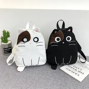 Pair of cute Japanese style cat-themed backpacks in black and white with ear details