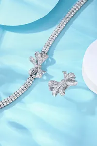 Elegant silver sparkling bow ribbon bracelet set with detailed jewelry craftsmanship