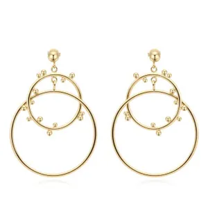 Close-up view of elegant 18K gold plated double hoop drop earrings with bead details.