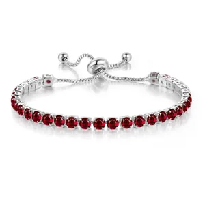 Detailed view of adjustable silver tennis bracelet with 4mm round red zircons