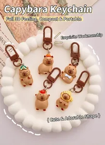 Cute resin capybara keychains set with adorable cartoon hats and accessories for bags