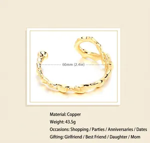 Irregular open cuff bracelet in 18K gold plating showing 60mm diameter and 43.5g weight