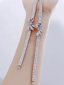 Elegant silver-tone bow ribbon bracelet with sparkling simulated diamonds for parties