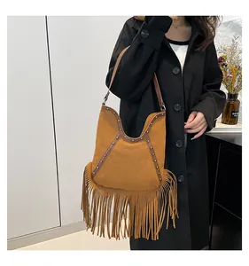 Bohemian vintage brown suede tote bag with long fringe and silver stud details