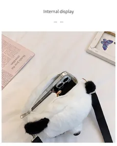 Detailed view of the cute plush panda crossbody bag showing internal capacity.