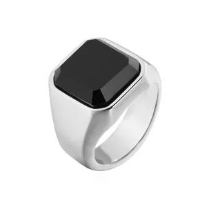 Detailed view of men's vintage silver ring with a large square black onyx stone