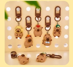 Cute cartoon capybara resin keychains with funny hat designs for bag decoration