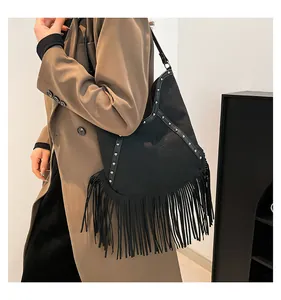 Bohemian style black tote bag with long fringes and silver stud details