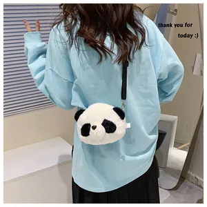 Back view of a person wearing a cute white and black plush panda-shaped cross-body bag.