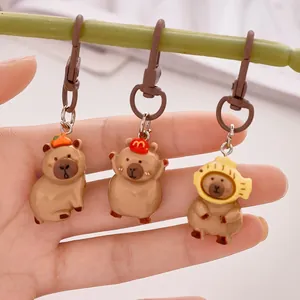 Set of three cute cartoon Capybara resin keychains and bag charms for school bags