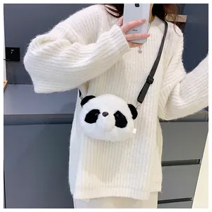 Cute cartoon panda plush crossbody bag shown on a model for scale and style