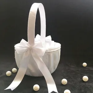 Elegant white satin wedding flower girl basket with ribbon bow and pearls