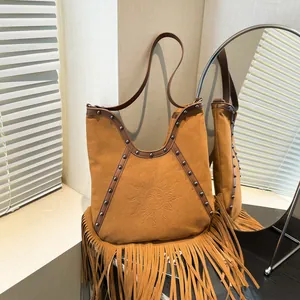 Bohemian Vintage PU Leather Shoulder Bag For Women Retro Fringed Tassel Tote Bag With Sun Embossed Pattern Metal Rivets Decor