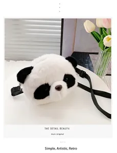 Close-up of a cute plush panda-shaped shoulder bag with soft faux fur texture.