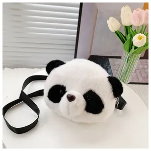 Cute panda shaped plush crossbody bag with soft faux fur and black strap.