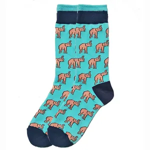 Close-up of mid-calf cotton socks with pink elephant pattern on a teal background.