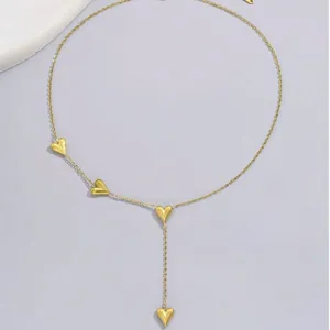 Minimalist gold-plated stainless steel Y-shaped necklace with four small heart pendants