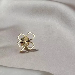 Elegant golden hollow four-leaf clover brooch pin for women clothing anti-exposure