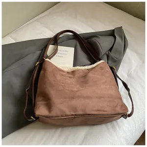 Close-up of winter brown faux fur tote backpack with soft plush trim