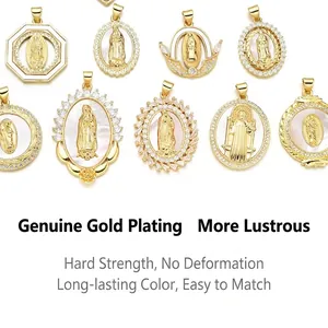 Detailed view of gold-plated religious pendants with white mother of pearl and zirconia
