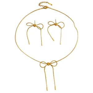 Elegant stainless steel gold bowknot necklace and earrings jewelry set for women.