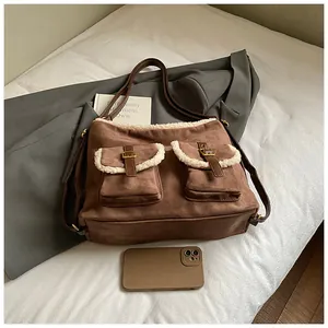 Vintage brown suede tote bag with white faux fur trim and dual front buckle pockets