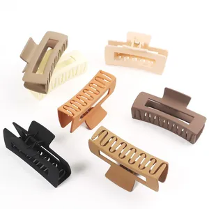 Six large matte rectangle hair claw clips shown in assorted neutral earthy tones