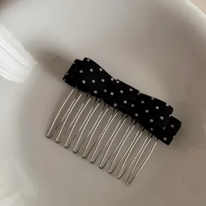 Elegant black polka dot bow metal hair comb accessory for high skull top padding