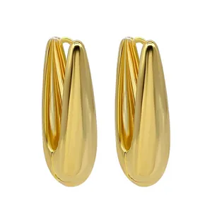 Elegant teardrop-shaped gold hoop earrings with smooth metallic finish and minimalist design.