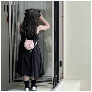 Bolso de hombro circular rosa de cuero PU para niñas con elegante cadena dorada