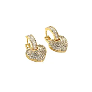Elegant gold-tone heart drop earrings encrusted with shimmering cubic zirconia stones.