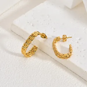 Detailed view of textured gold stainless steel hoop earrings with size measurements