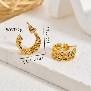 Detailed view of vintage gold stainless steel textured starry hoop earrings 15mm wide